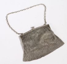 Continental silver evening bag, with chain link strap and silver clasp above a chainmail mesh