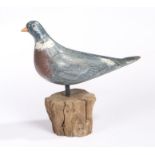 A decoy pigeon, painted in grey with a red bib and white collar, raised on a later stand, 33cm long