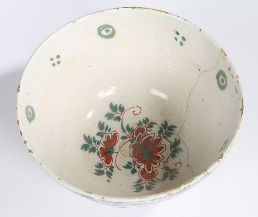 An 18th Century Delft punch bowl, polychrome decorated with flowers and birds, 25.5cm diameter, 14cm - Image 2 of 2