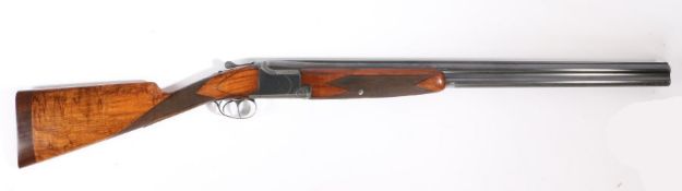 A Browning Belgium B25 A1 Lightweight 12 bore over and under shotgun, with 27.5" barrels, the walnut