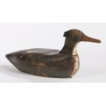 A decoy duck, painted in brown with a long beak, 45cm long