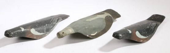 Pigeon lures, to include two painted metal examples and a painted canvas example, (3)