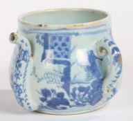 A late 17th Century English Delft posset pot, circa 1680, decorated in blue with an Oriental scene