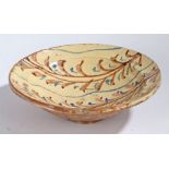 A large 19th Century French bowl, with reed bands in blue and brown, crack, 30.5cm diameter