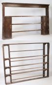 An 18th Century dresser rack, with a concave cornice above three shelves and two cupboards, 193cm