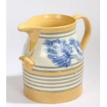 A large 19th Century Mocha ware jug, the yellow ground with cream and blue bands and a blue branch