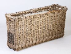 A 19th Century French wine bottle basket, with carrying slots to the sides, 107cm wide, 33cm deep,