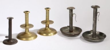 A pair of 17th Century style brass candlesticks, trumpet form with drip pan, 19cm high, together