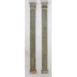 A pair of 18th Century painted pilasters, with concave cornice above a reeded upright, 123cm high,