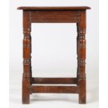 A Charles I oak joint stool, circa 1640 and later, the later rectangular top above turned legs