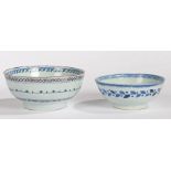 Two 18th Century Delft bowls, the first with a green, red and blue multiple border design,