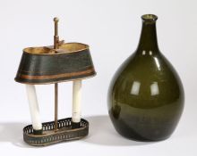 A 19th Century Toleware lamp, with a black and gold shade above two candle sockets and a shaped