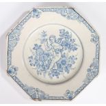 An 18th Century Delft plate, probably Bristol, with a cherub among flowers, with a flower and