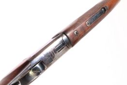 A Browning Japan 28 bore over and under shotgun, with 28" barrels and rubber butt plate to the