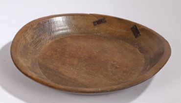 A 19th Century shallow bowl, with a rivet repair to the edge, 47cm diameter