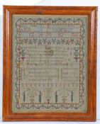 A George III named and dated sampler, with alphabet and numbers above a poem, named Charlotte Walker