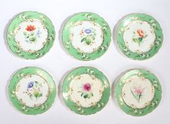 A set of six 19th Century porcelain plates, each polychrome decorated with a different flower