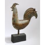 A zinc weathervane, in the form of a cockerel, on a later stand, 53cm long