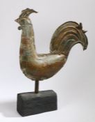 A zinc weathervane, in the form of a cockerel, on a later stand, 53cm long