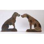 Two 20th Century Suffolk dummy boards, painted on oak in the form of dogs with lead weights to the