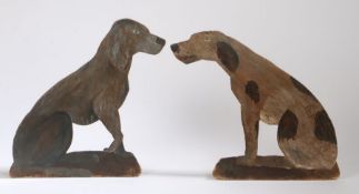 Two 20th Century Suffolk dummy boards, painted on oak in the form of dogs with lead weights to the