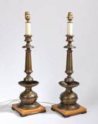 A pair of brass lamps, in the 17th Century taste, 50cm high, (2)