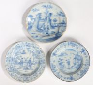 Three 18th Century Delft plates, each depicting an Oriental scenes within landscapes, 21cm