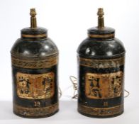 Two 19th Century Toleware tea cannisters, in black with gold borders and Chinese characters,