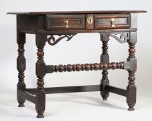 A William and Mary oak side table, the rectangular top above a single drawer with moulded decoration