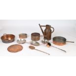 A collection of copper, to include a French watering can, copper pots, a pan, a skimmer and a