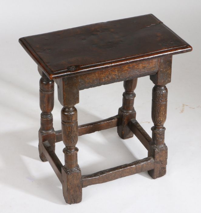 A Charles I oak joint stool, circa 1640, the rectangular top above turned legs united by stretchers, - Image 2 of 2