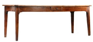 A 19th Century French chestnut and fruitwood farmhouse table, the plank top with cleated ends