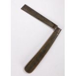 A rare and large 19th Century English whale blubber flensing knife, the large steel folding blade