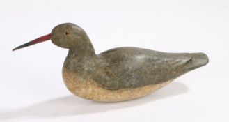 An early 20th Century decoy bird, with a red beak and bead eyes with a grey body and cream