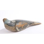 An early 20th Century painted pine pigeon decoy, 34cm long