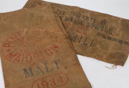 Two early 20th century hessian sacks, the first reading 'Pine & Sons, Corn & Seed Merchants,
