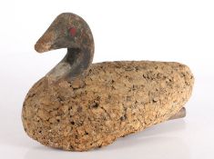 An early 20th century Spanish decoy duck, in wood and cork, with original attached weight, 29cm