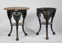 A near pair of cast iron garden tables, one by Caskell & Chambers ltd. Birmingham, with pierced lion