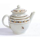 An 18th Century miniature pearlware teapot, with stylised foliate decoration, 9cm high