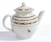 An 18th Century miniature pearlware teapot, with stylised foliate decoration, 9cm high