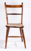 A Victorian yew and elm dining chair, with curved cresting rail, turned and reeded splat back,