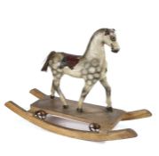 A 19th Century English toy rocking horse, circa 1870, dapple colour with a leather saddle raised