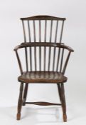 A George III stick back ash and elm painted Windsor armchair, West Country, circa 1800/1820, the