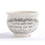 A 19th Century porcelain miniature chamber pot, inscribed "I LOVE BUT THEE OH SMILE ON ME", 7.5cm