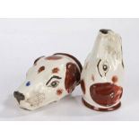 A pair of 19th Century porcelain stirrup cups, 1820/1830, in the form of hound's heads with brown