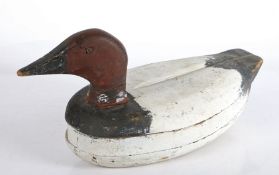 An early 20th century American wooden decoy duck, painted black, brown & white, 38cm long,16cm