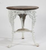 A cast iron pub table by G.H. Tuffield of Norwich, the later circular top above pierced fruiting