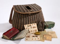 A collection of fishing flys housed in a wicker creel (qty)