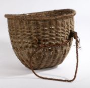 An early to mid 20th Century wicker basket, of circular form, with rope carrying handle - possibly