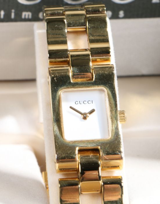 A Gucci ladies gilt stainless steel wristwatch, ref. 2305L, circa 1998, with named white dial, on - Image 2 of 2